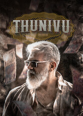 Kliknij by uszyskać więcej informacji | Netflix: Thunivu | A major bank heist takes an unnerving turn when a mysterious interloper known only as Dark Devil begins to hijack the operation.