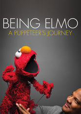 Kliknij by uszyskać więcej informacji | Netflix: Being Elmo: A Puppeteer's Journey | Dokument opowiadajÄ…cy niesamowitÄ… podróÅ¼ Kevina Clasha — lalkarza, który wykreowaÅ‚ postaÄ‡ Elmo — z robotniczego Baltimore aÅ¼ do „Ulicy Sezamkowej” Jima Hensona.