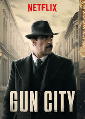Kliknij by uszyskać więcej informacji | Netflix: Gun City | Barcelona, rok 1921. TrwajÄ… starcia anarchistów z policjÄ…. W tym chaosie pewien policjant próbuje ustaliÄ‡, kto ukradÅ‚ broÅ„, która moÅ¼e doprowadziÄ‡ do wojny domowej.